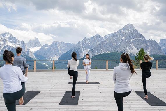 Hatha yoga with a panoramic view of the Dolomites